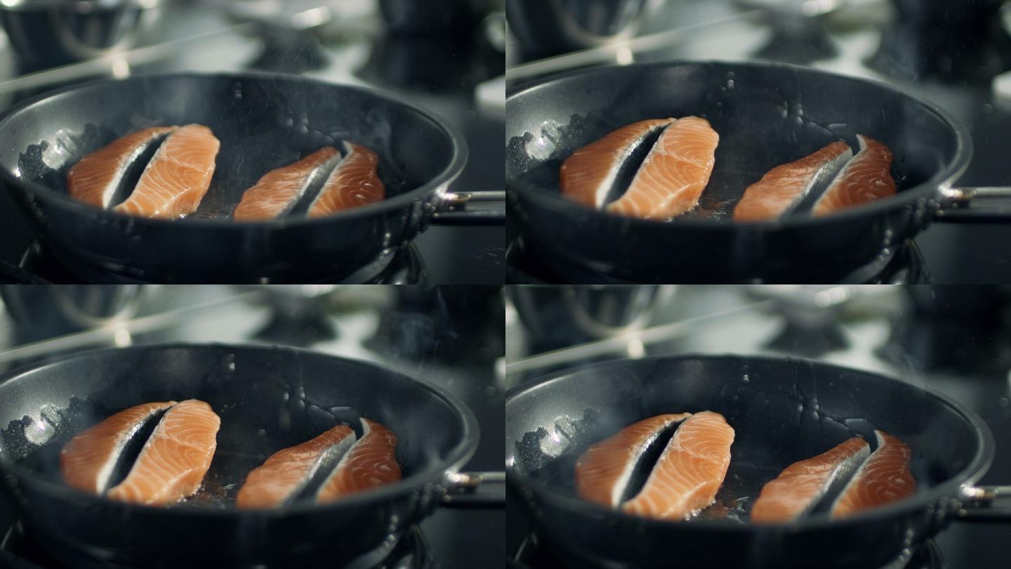 在热锅上煎鱼片的特写镜头。