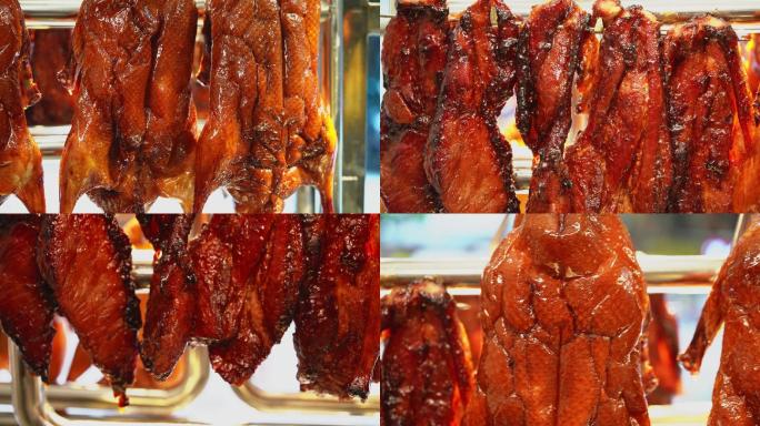 广东烧卤店的展示橱窗上新鲜的叉烧和烧鸭