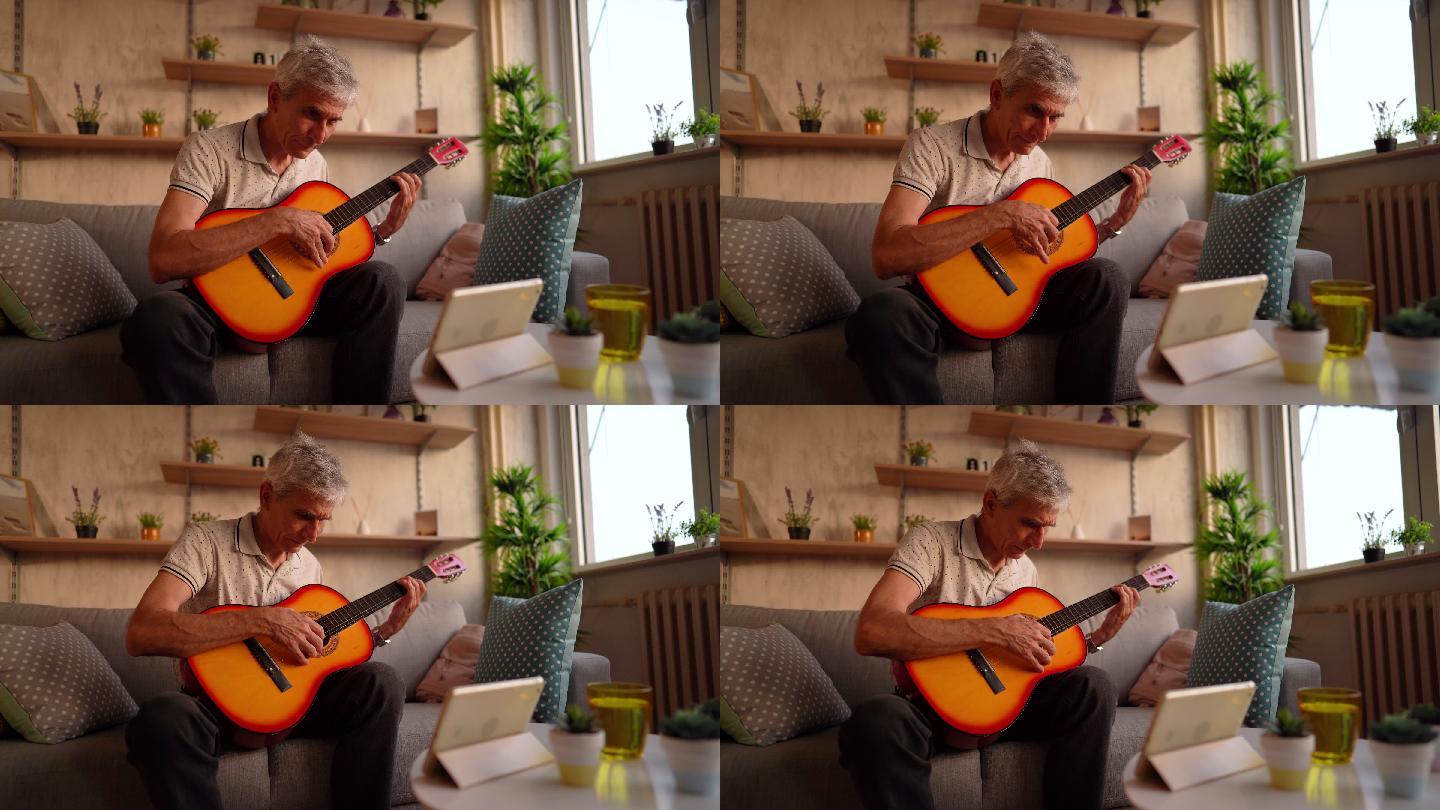 弹吉他的老人国外外国老年人学习练习