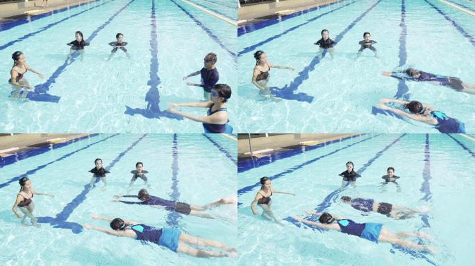 中国游泳运动员在泳池教授游泳技巧