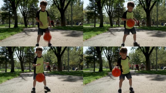一个在公园里玩篮球的小男孩