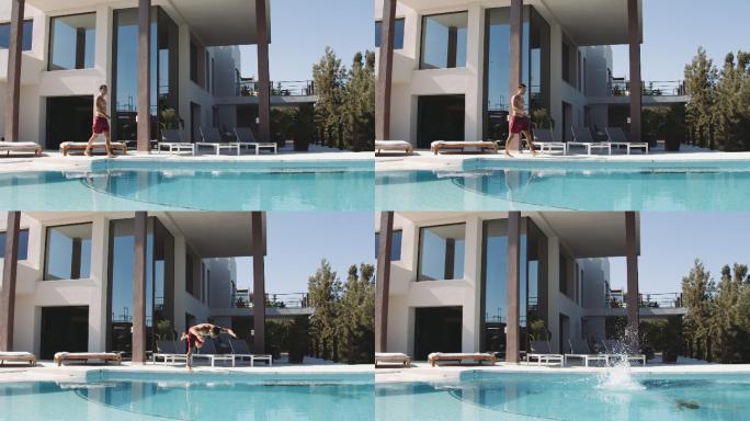 男子潜入游泳池慢动作升格镜头入水潜水