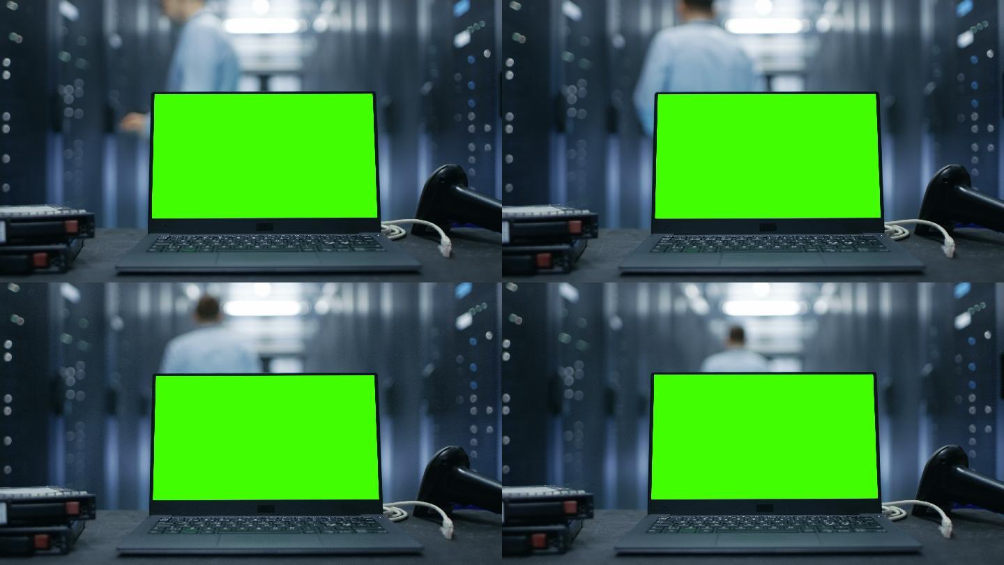 一台绿色屏幕的笔记本电脑