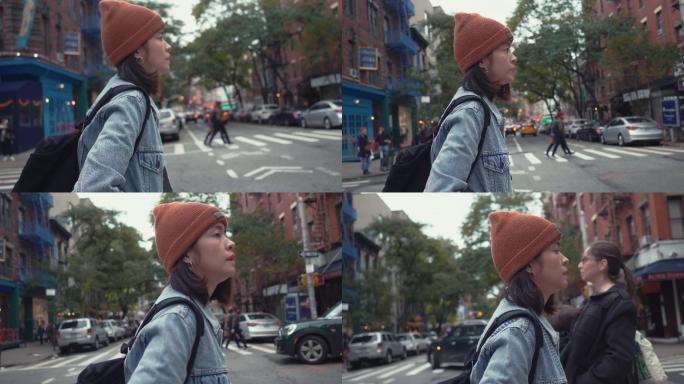 一个在街上独自行走的时髦女人。