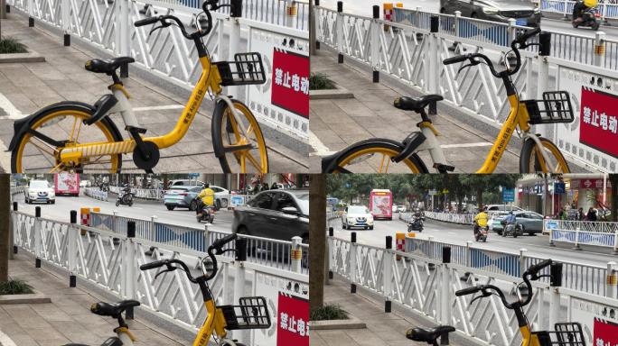 一辆黄色美团共享单车停放在自行车停放区内