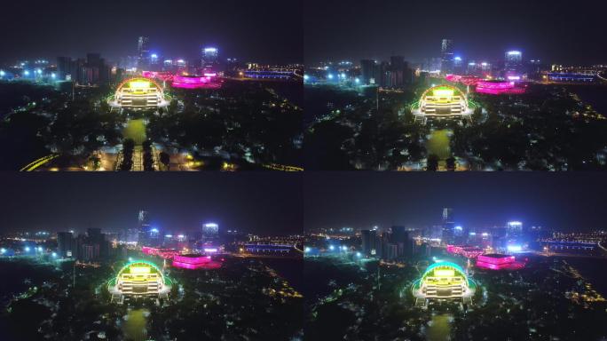 航拍夜晚金华金东新城城区中国婺剧院夜景