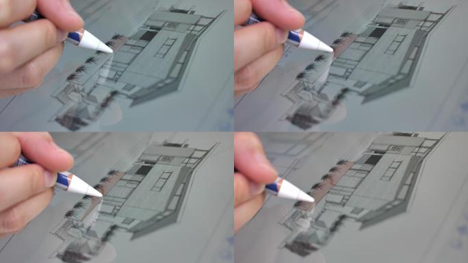 建筑师用数码笔用平板电脑画画