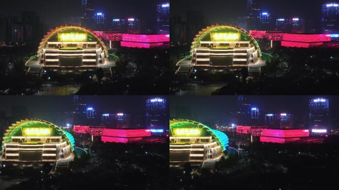 航拍夜晚金华金东新城城区中国婺剧院夜景