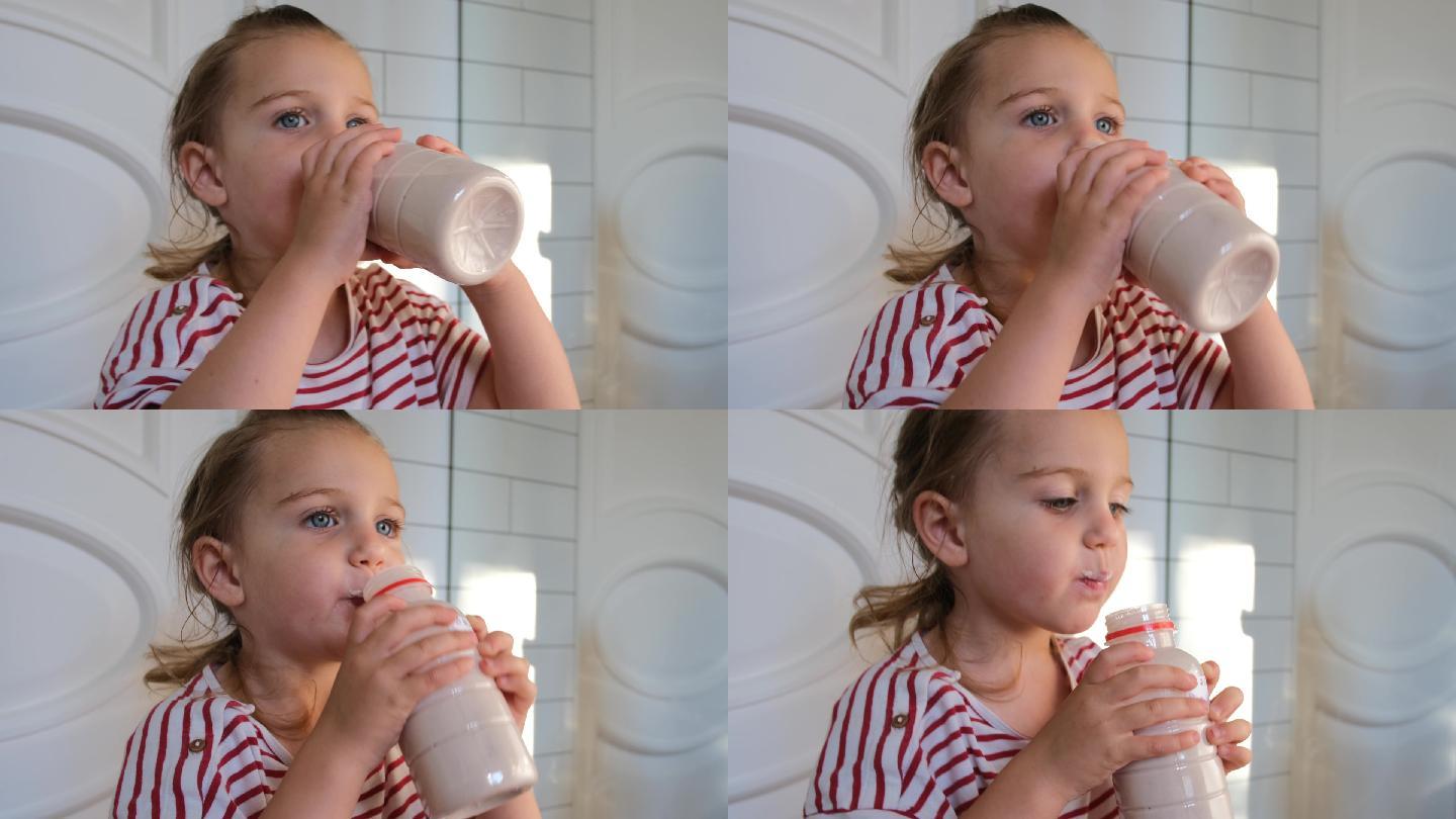学龄前女孩喝酸奶T恤接近