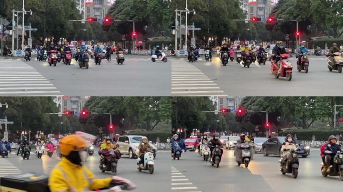 下班小高峰电动车群绿灯过马路