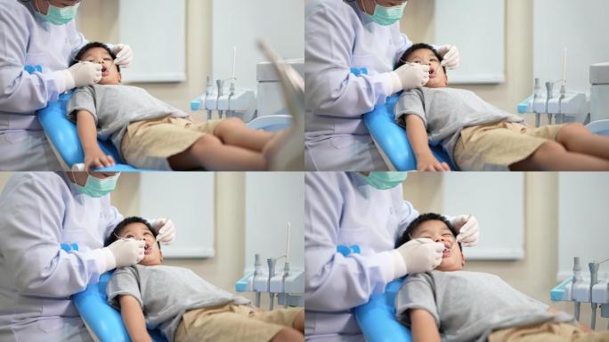 小孩在牙科诊所做检查。