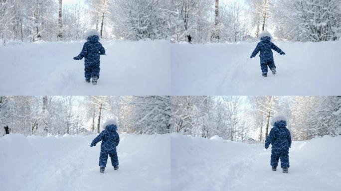 在雪地上奔跑的小男孩