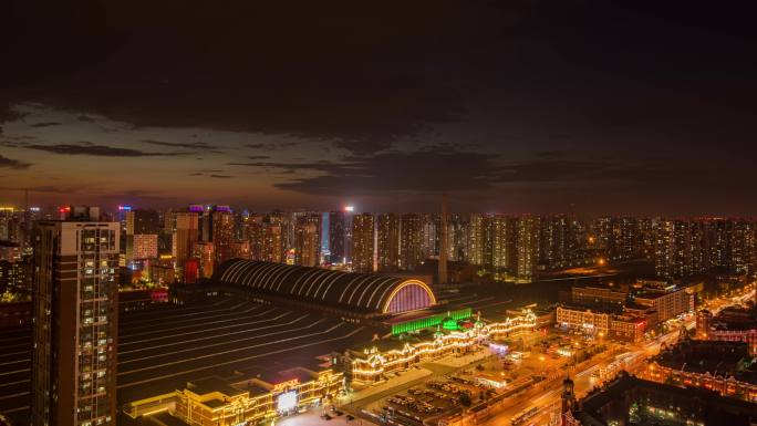 沈阳高铁站晚霞夜景人流车流延时