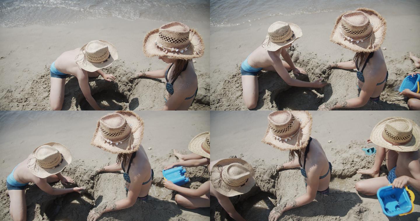 三个孩子在海滩上玩耍