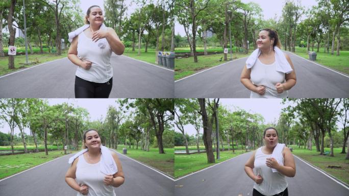 女子在户外跑步肥胖的女人跑步减肥微笑的晨