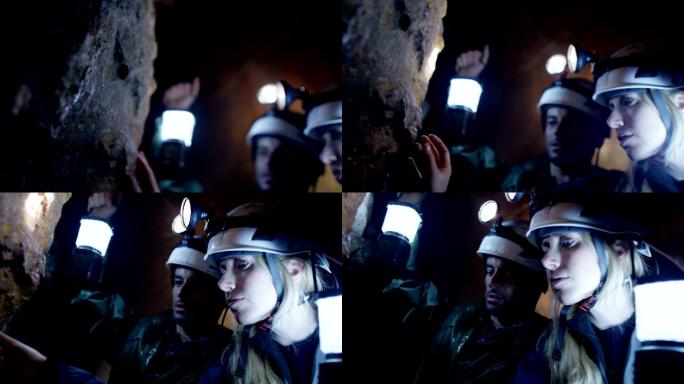 矿工探索黑暗的洞穴