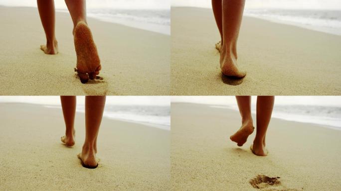 松软沙滩上的脚步
