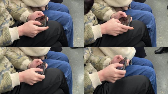 4K地铁车厢上刷手机特写镜头