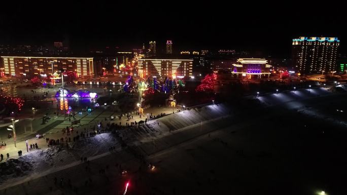 航拍嫩江市江畔广场 雪雕 县标 夜景