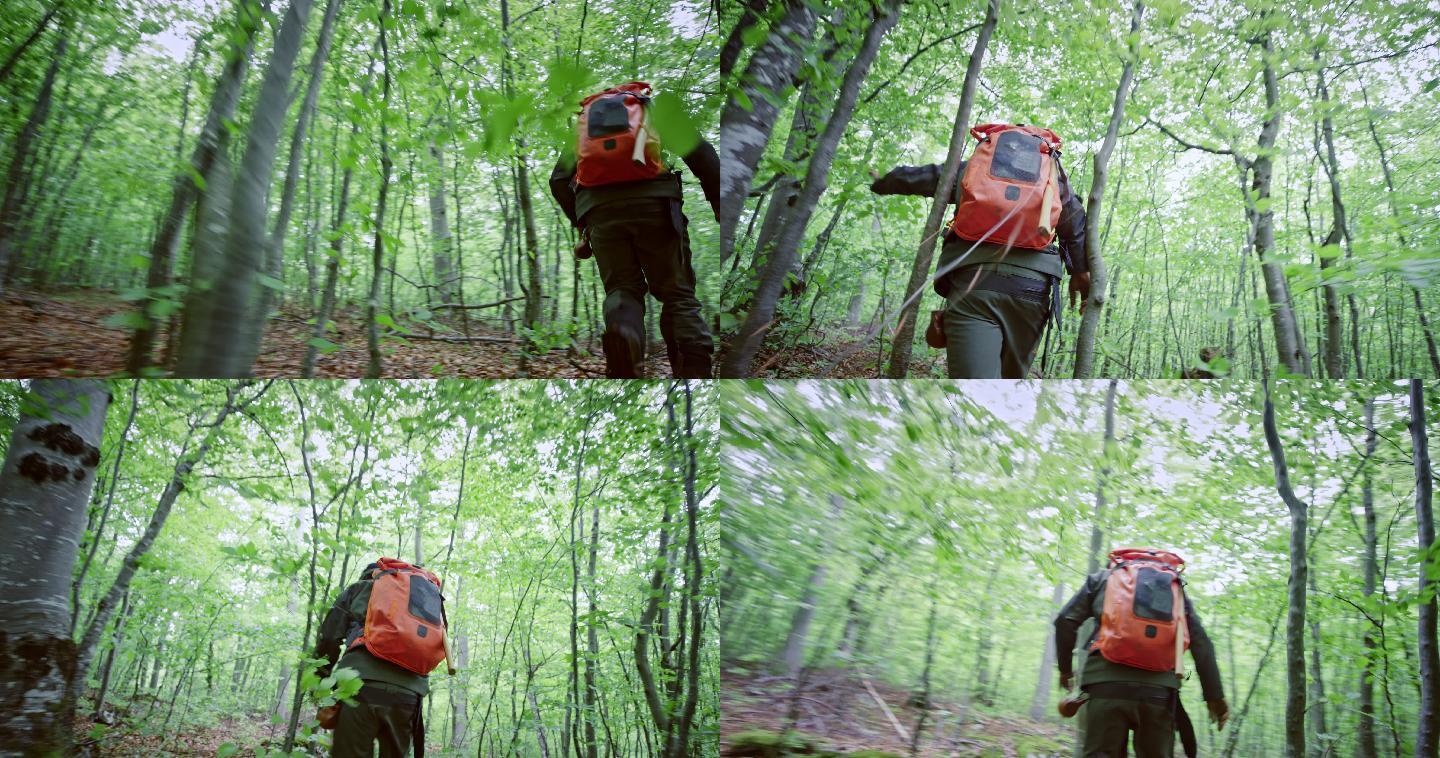 生存专家在森林中奔跑
