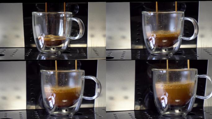 咖啡机在杯子里装满热咖啡