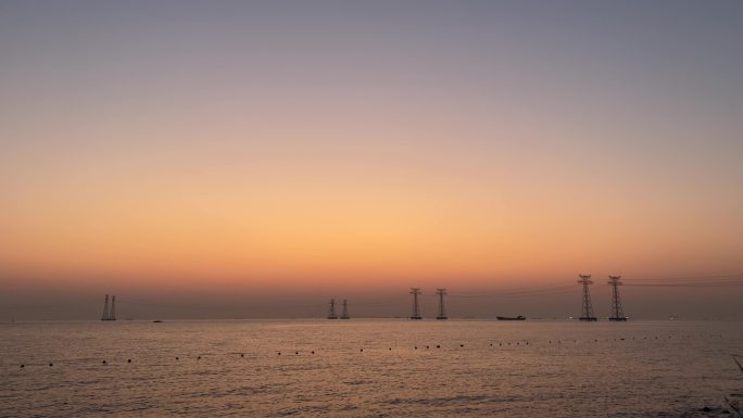 夕阳日落黄昏大海海边飞机航空降落晚霞