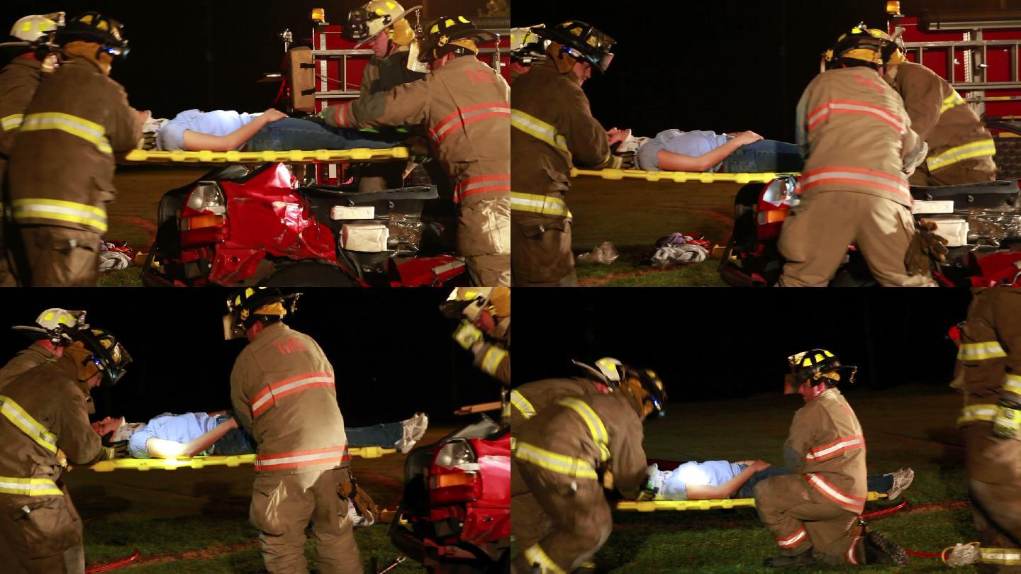 消防员在车祸中帮助受害者。