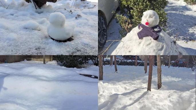 冰天雪地小区小孩玩雪人堆雪阳光照雪地