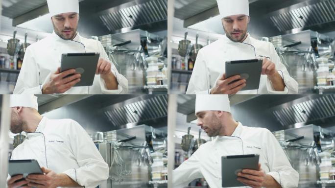 专业厨师正在使用平板电脑。