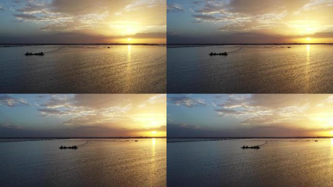 航拍夕阳下的察尔汗盐湖