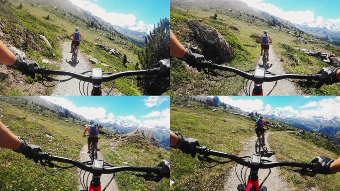 一对骑山地自行车的夫妇在瑞士泽马特旅行