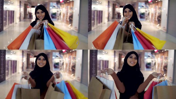 美丽的女性购物穆斯林黑色头巾面纱中东国家