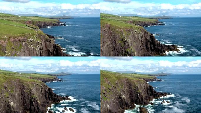 爱尔兰悬崖前的蓝色海水