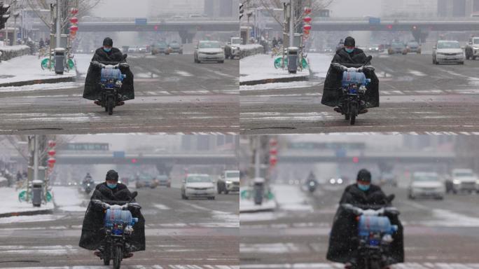 北京风雪中外卖快递骑手