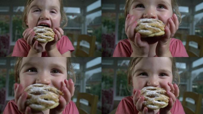 小女孩在吃家常馅饼