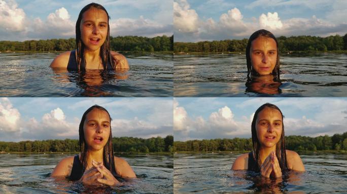 15岁的少女在湖里游泳