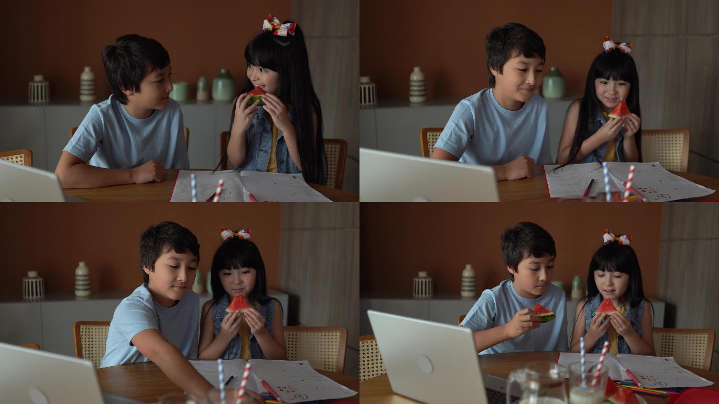 兄妹一起学习，在家吃西瓜