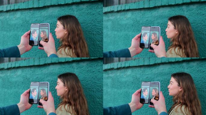 夫妇在不同的智能手机上拍摄自己
