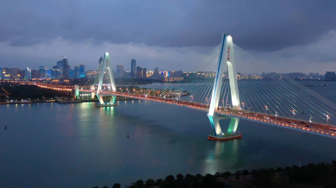 海南海口世纪大桥夜景城市海甸河航拍4K