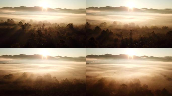 晨曦中的太阳光，云雾和山脉