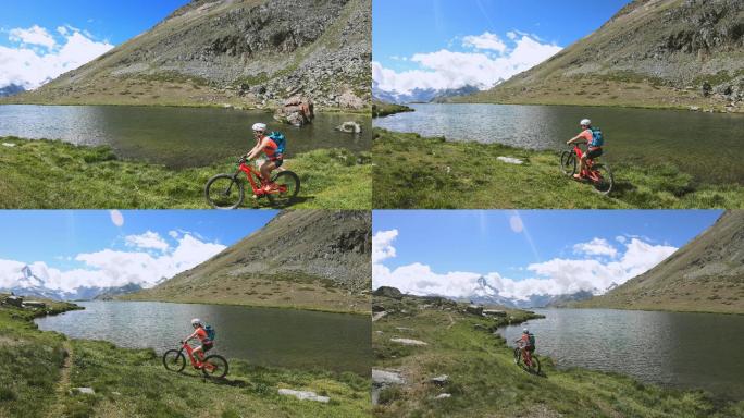 一名女子在湖边骑山地自行车