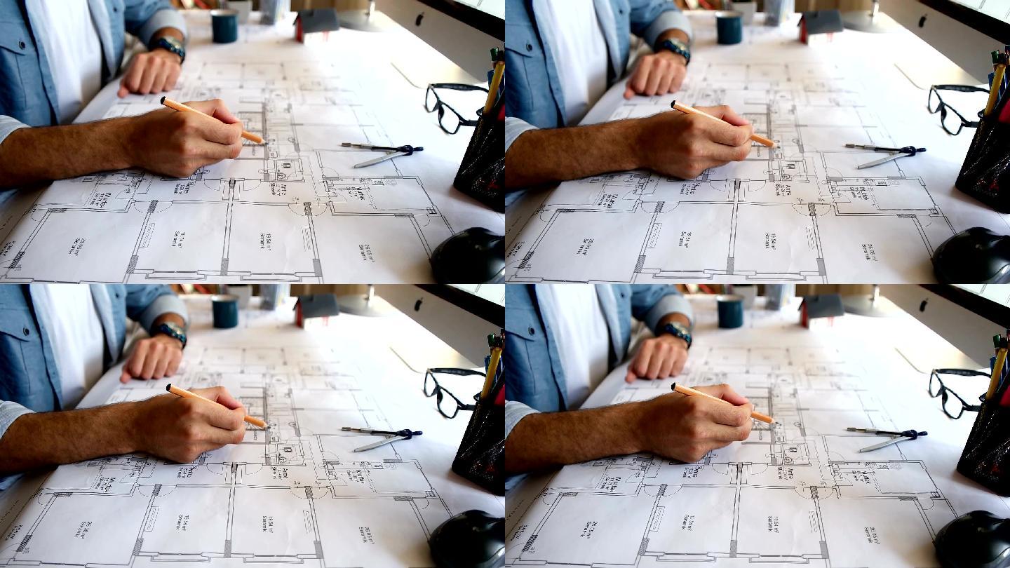 建筑师在勾画一个建筑项目的概念。