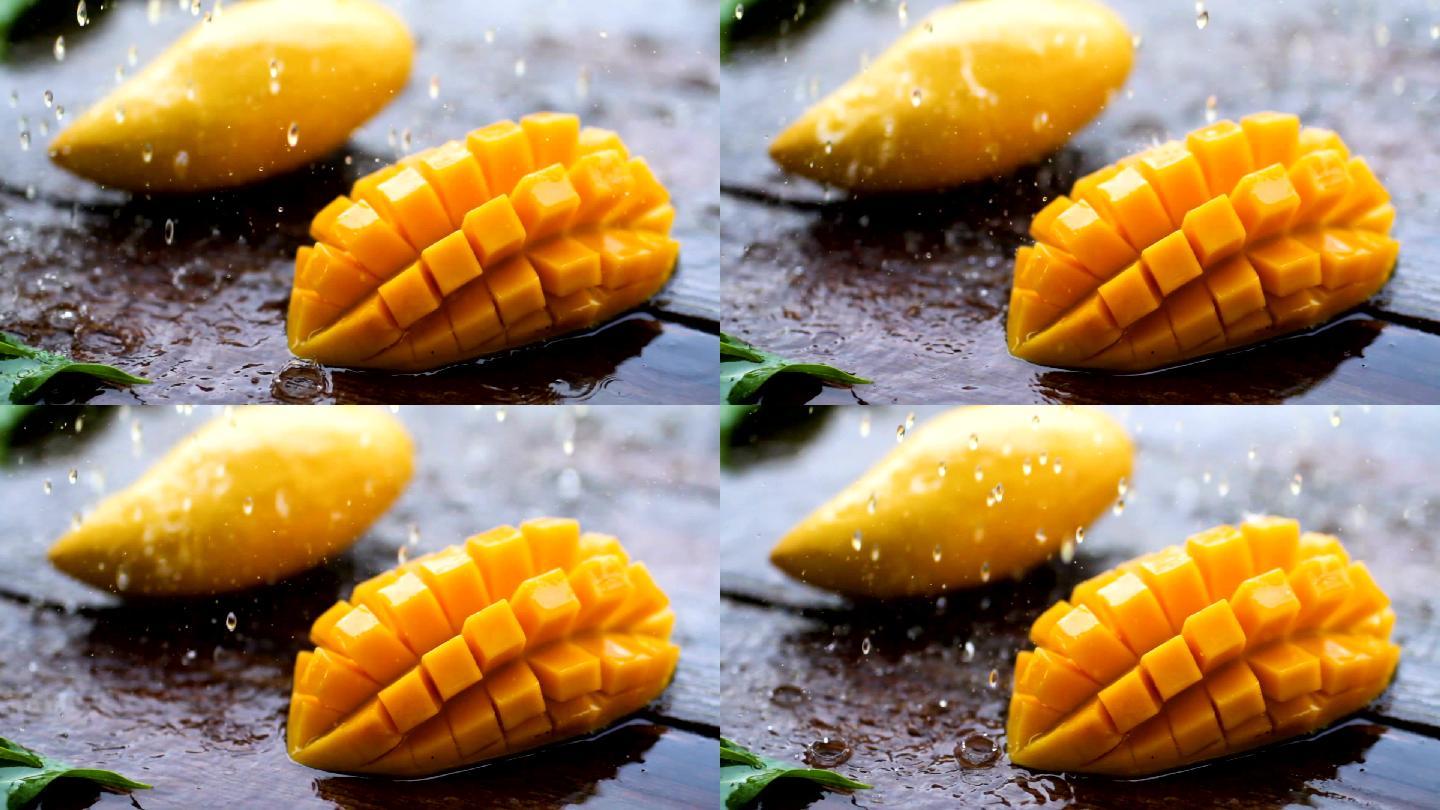 芒果和雨滴水果慢动作入水创意特写主图视频