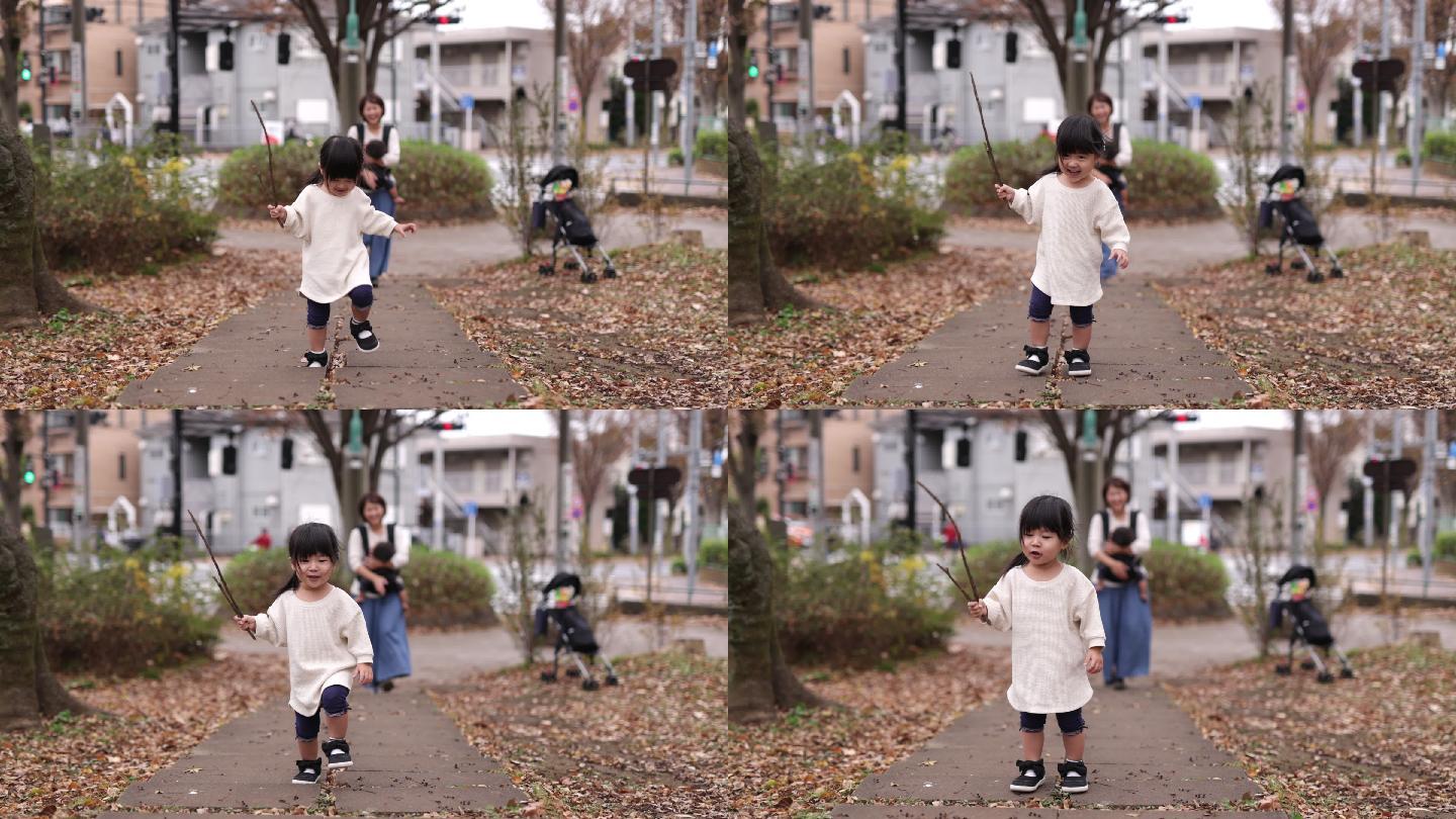 快乐的小女孩在公共公园散步