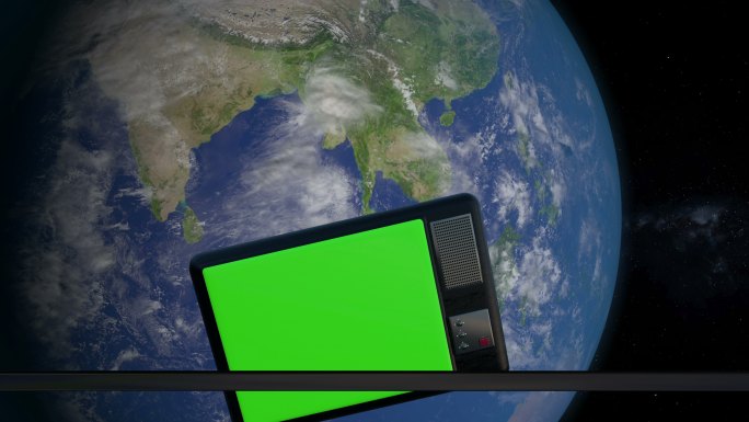 环绕地球运行的绿色屏幕电视