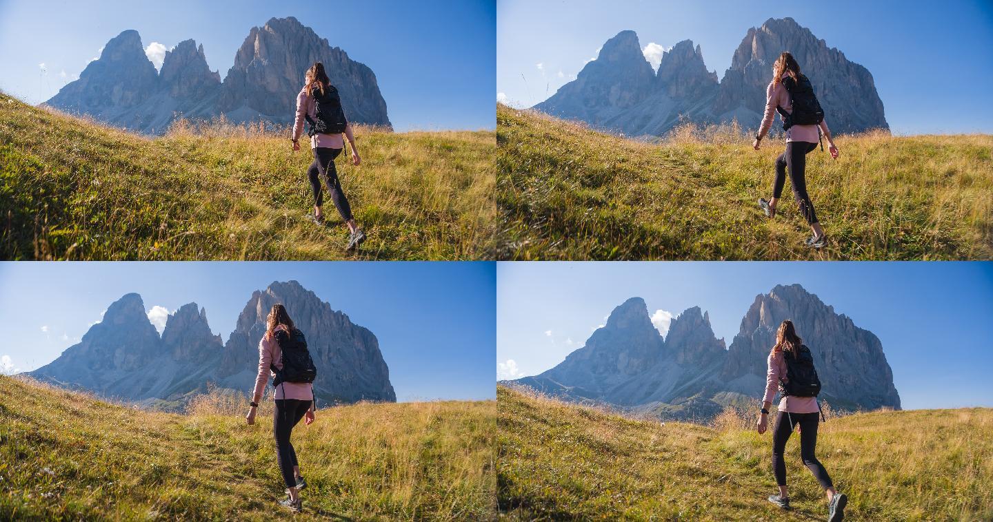 女徒步旅行者在风景优美的山中