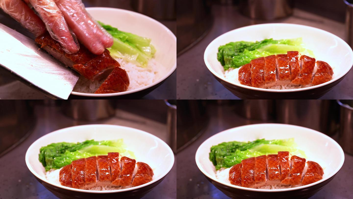 广东烧卤店的师傅在切烧鸭，装盘做烧鸭饭