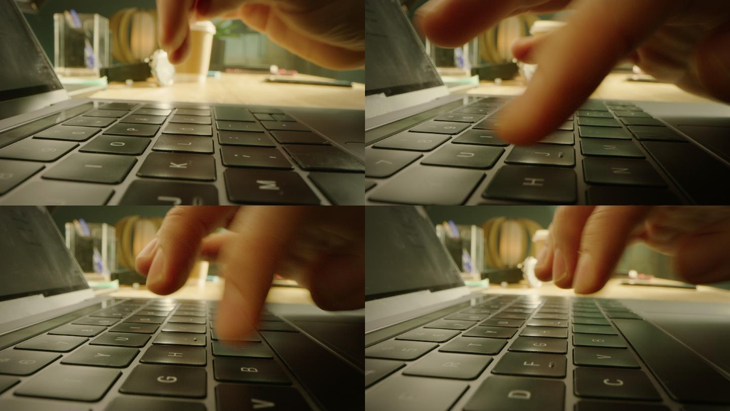 在电脑键盘上打字的人。