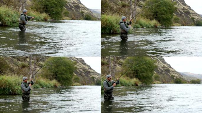 钓大鱼的人钓鱼上钩鱼儿上钩钓鱼出水面瞬间