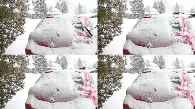 住宅车道一个人从车上刮雪